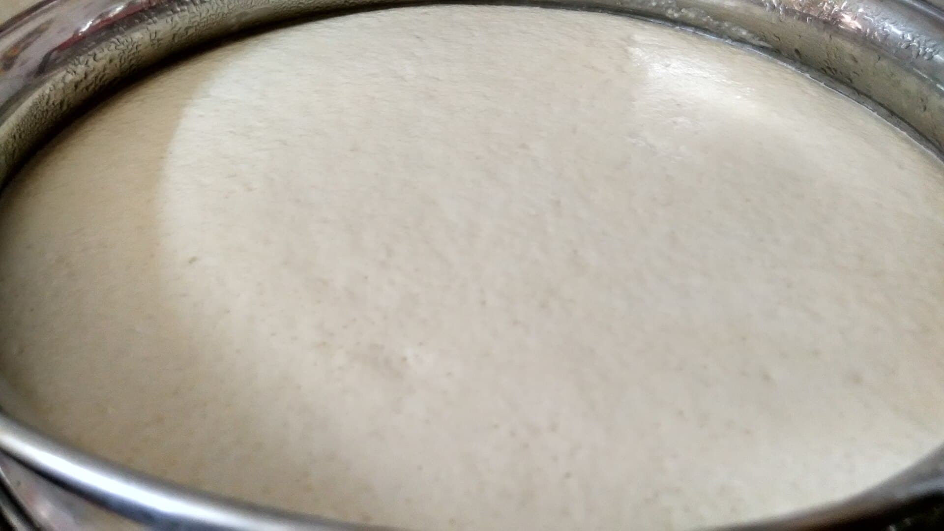Controlled steam parboiling and drying of rice paddy